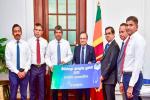 SLT-MOBITEL steps forward to support the Poson Aloka Pooja