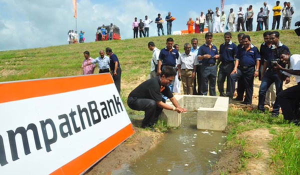 sampath-bank-renovates-dematawa-tank-at-paduvasnuwara