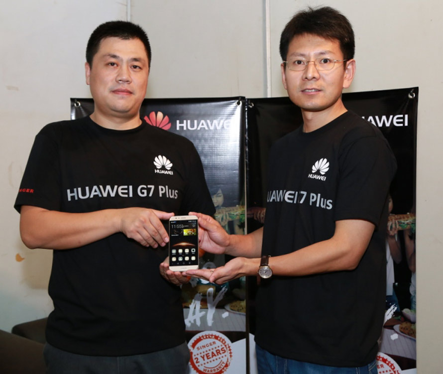 Henry Liu Country Head Huawei Device Sri Lanka left with Shunli Wang CEO Huawei Sri Lanka introducing the latest Huawei G7 Plus smartphone during its launch end November at the Singer Lifestyle Festival